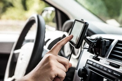 woman setting gps.jpg.838x0_q67_crop-smart